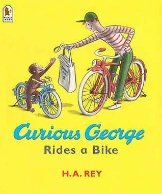 Curious George Rides a Bike